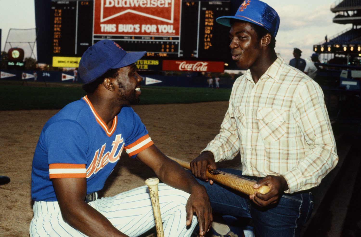 Mookie Wilson Chatting with Unknown Person at Shea Stadium