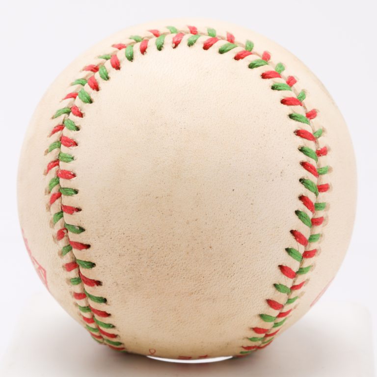 Baseball with Red and Green Stitching Used in La Primera Serie