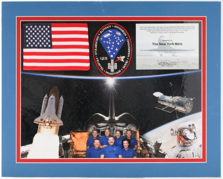 Photo of Astronauts Including NASA Badge and American Flag