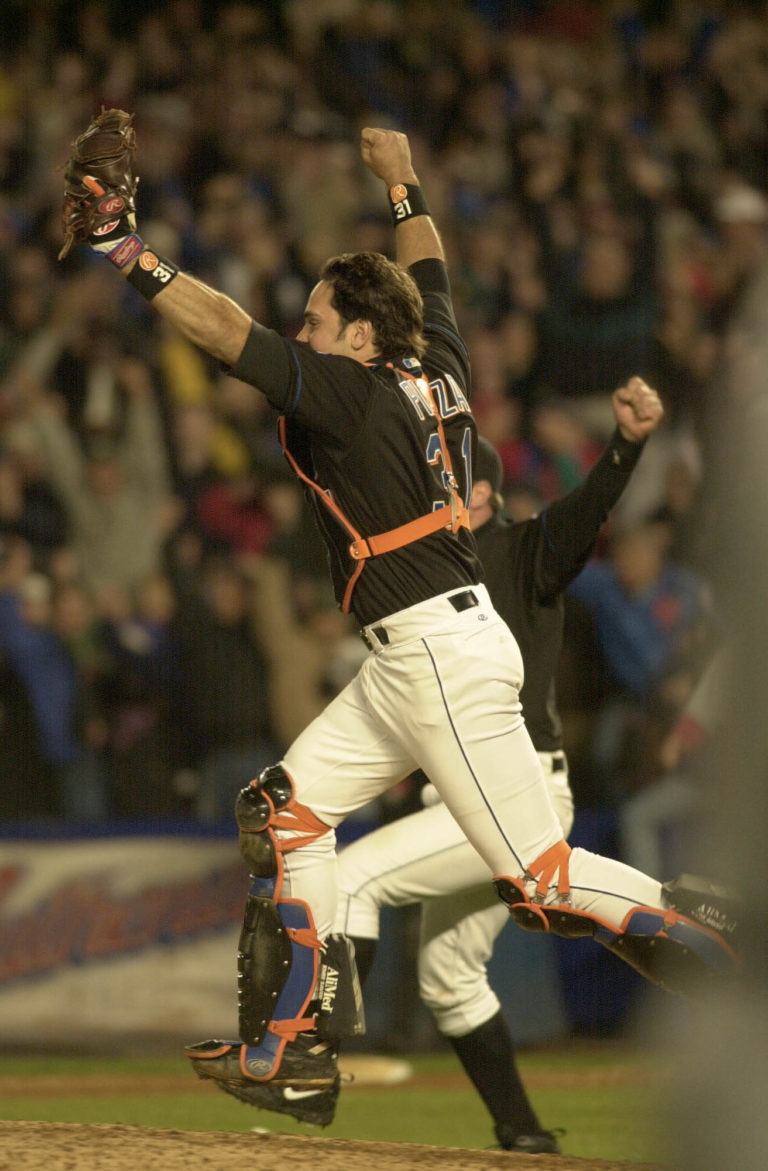 Mike Piazza Celebrates a Victory in Catcher's Gear