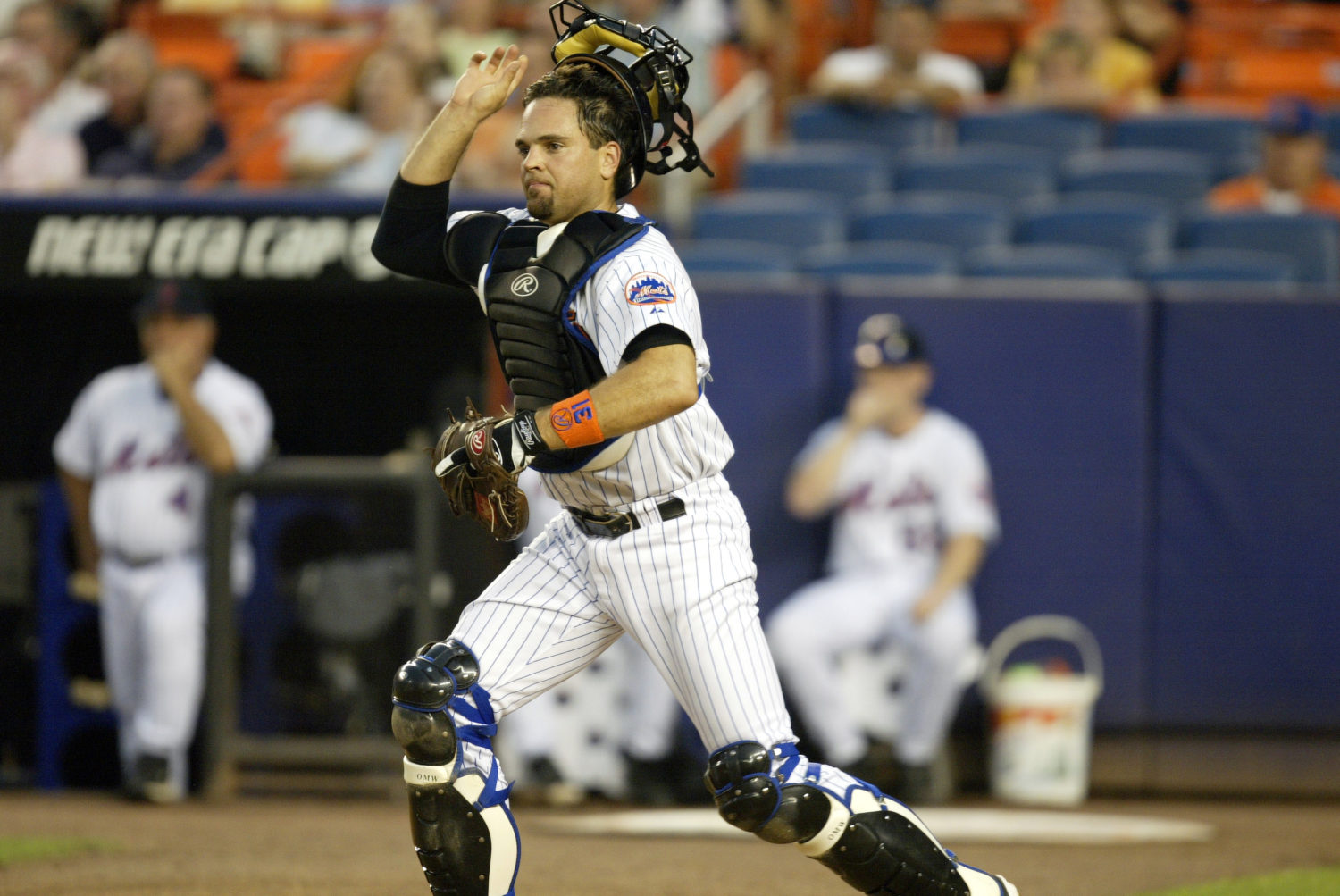 Mike Piazza Removes Mask to Field a Ball
