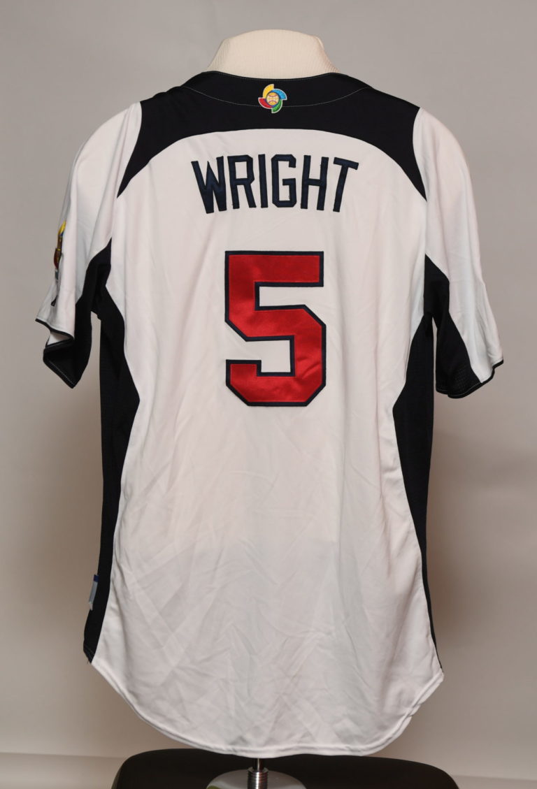 Back of white jersey that reads 