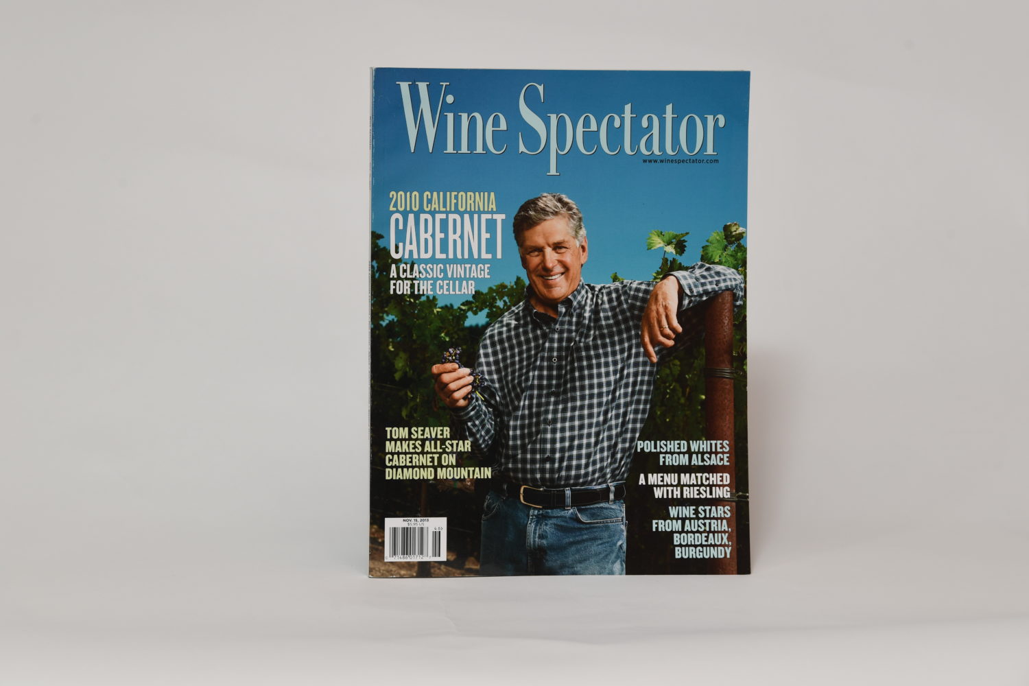 Cover of Wine Spectator magazine with Tom Seaver smiling while holding a vine