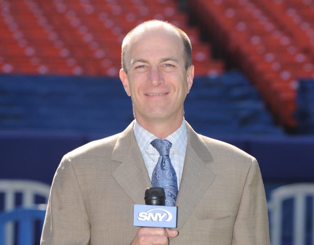 Gary Cohen Holding Microphone